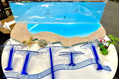 Flat-pack modular components of ocean beach sunglasses display stand